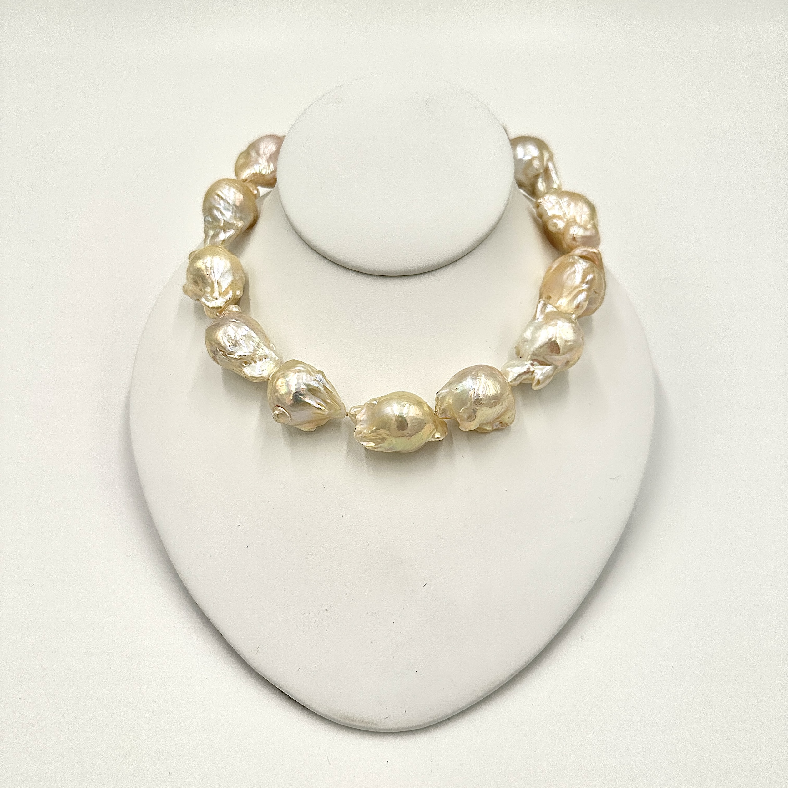 Image of Giant Creamy High Luster Freshwater Pearl Strand on Hand Cast Brass Hooks by Marcia McDonough