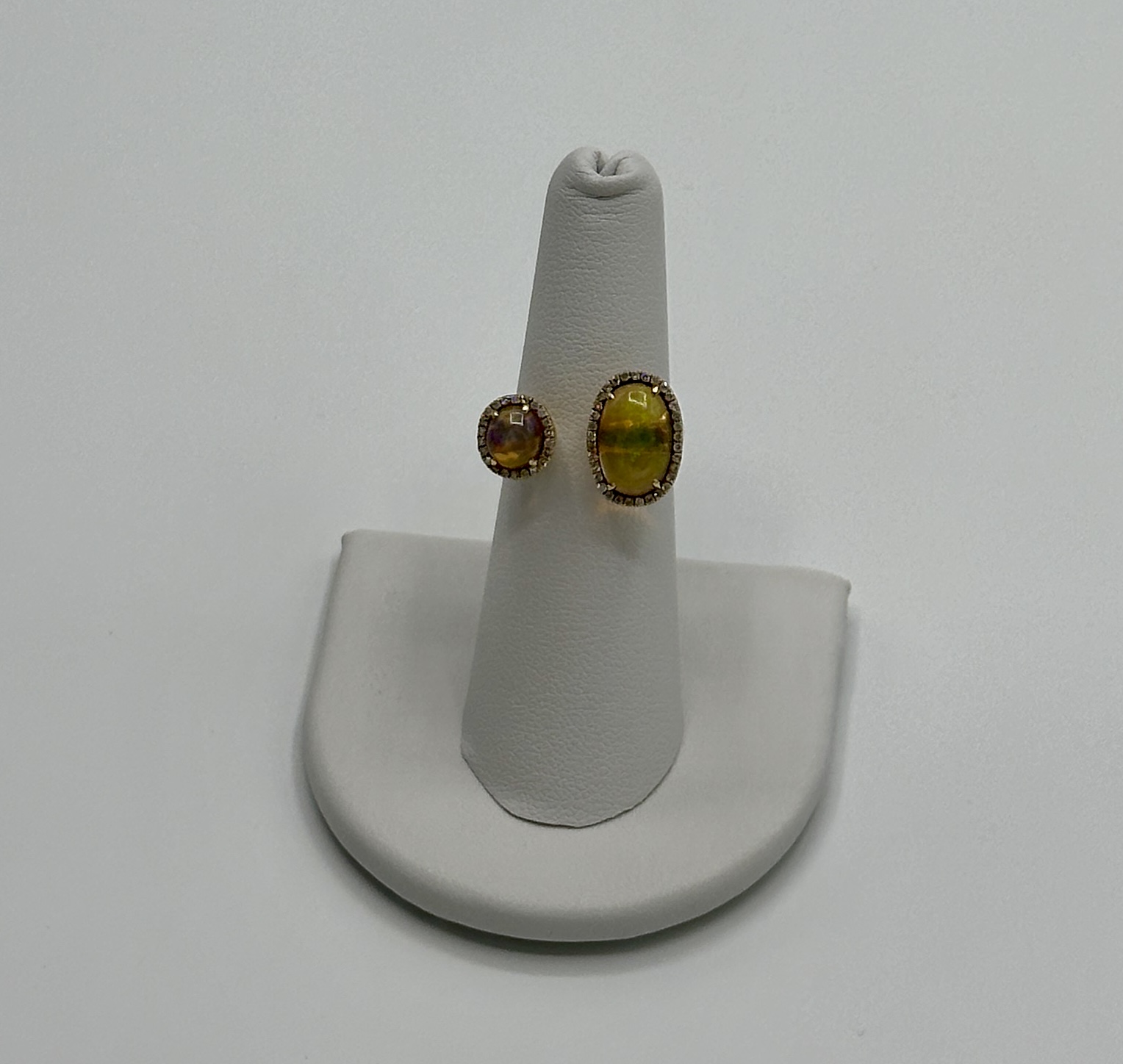 18 Karat Yellow, Gold, Opal and Diamond Bypass Ring. .21 Carat Diamond, 1.81 Carat Opal.