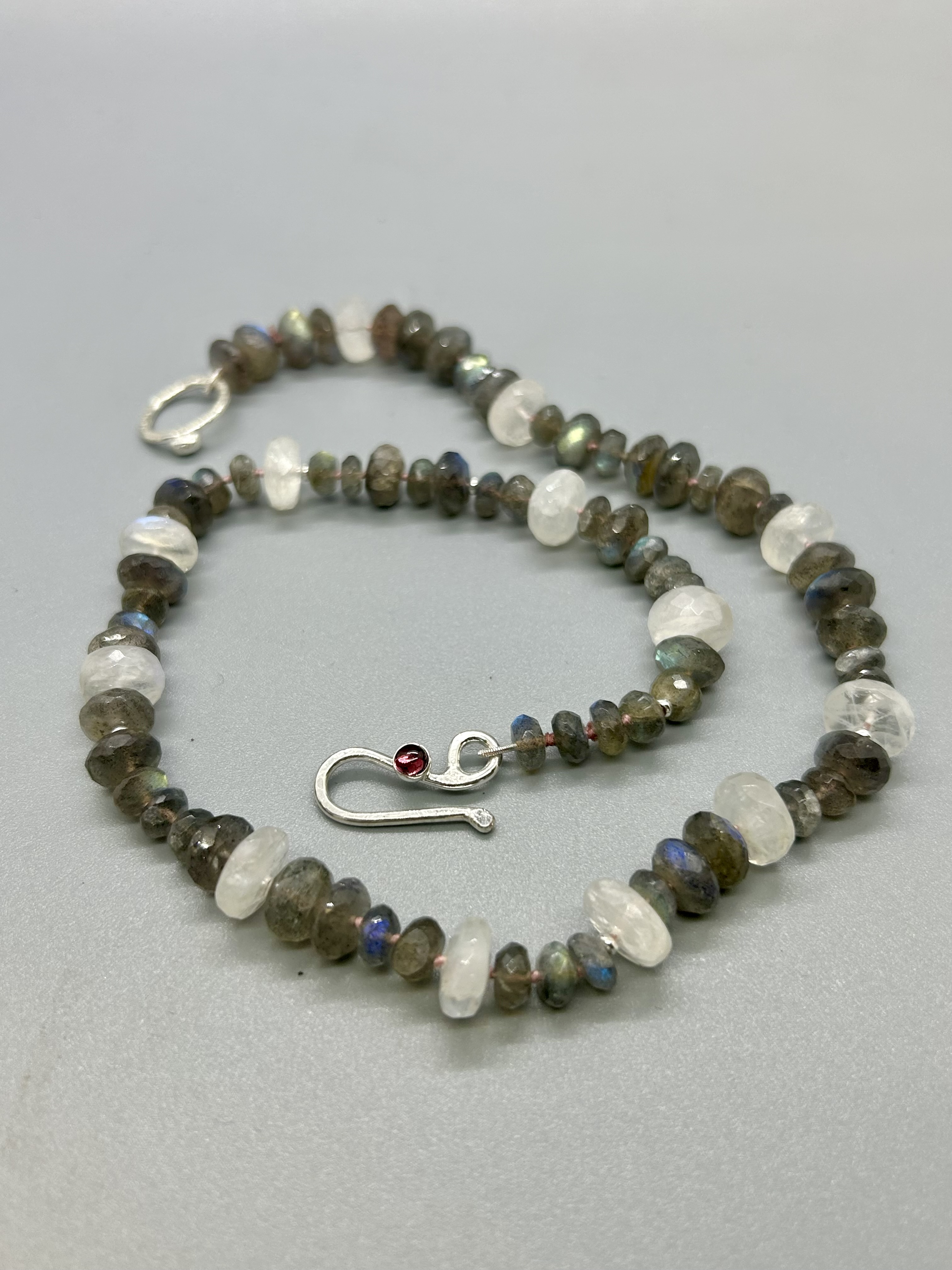 Image of Labradorite and Moonstone Necklace with Sterling Clasp and Garnet Gemstone by Olga Ganoudis