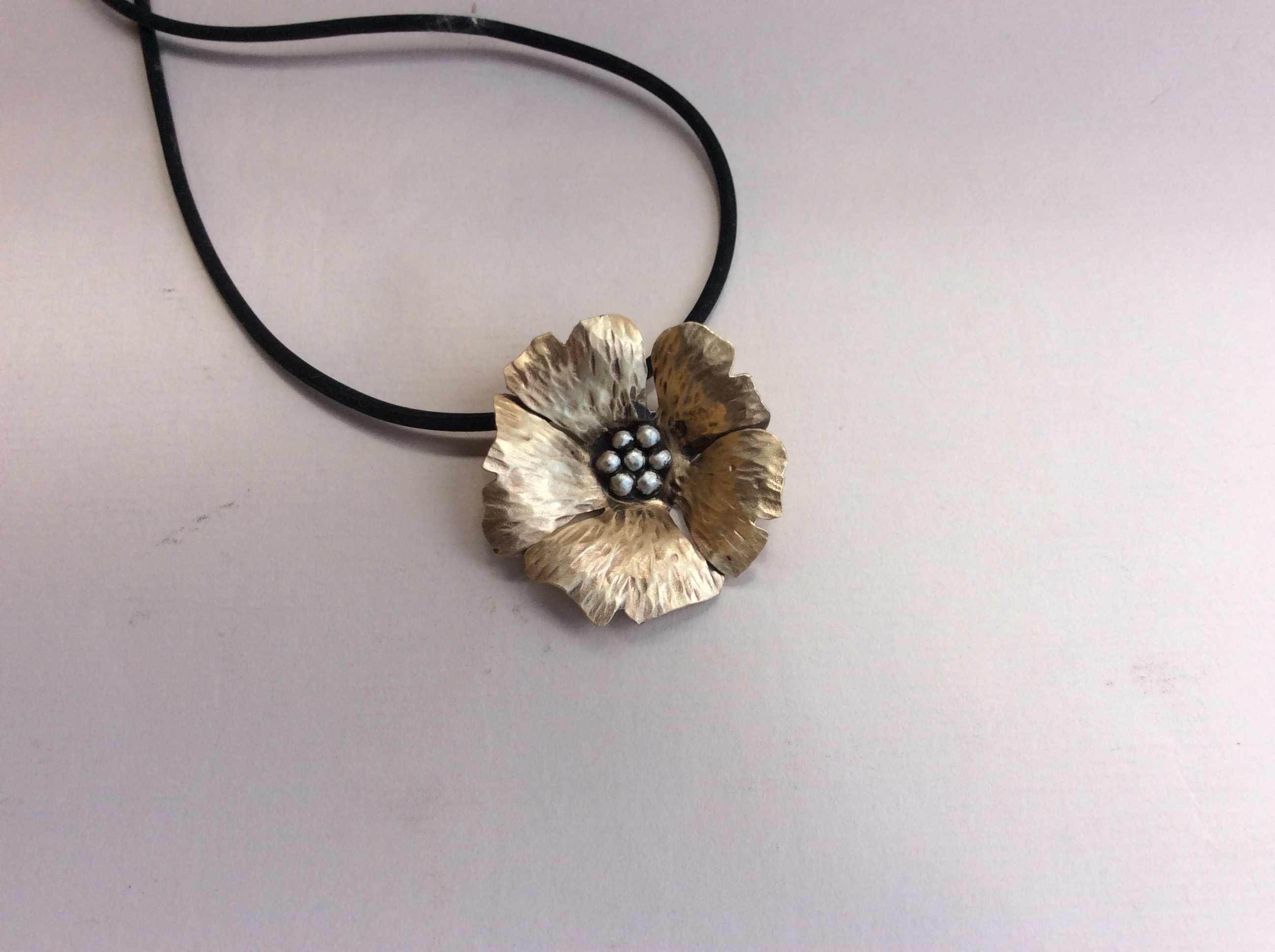 Poppy Anemone Pendant, Brass and Silver on Rubber Cord