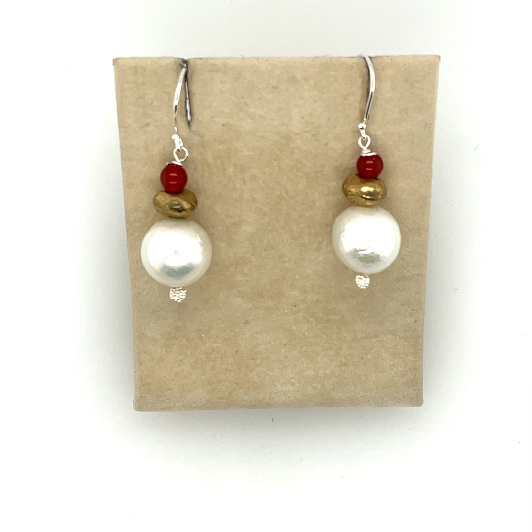 Edison cultured, freshwater pearls natural color. 12 to 15 mm Sterling earrings.