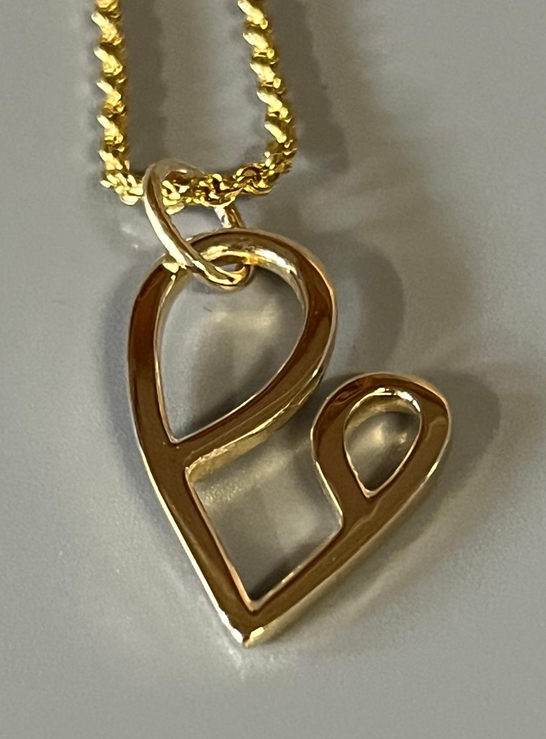 Gold Mother and Child Pendant on 20