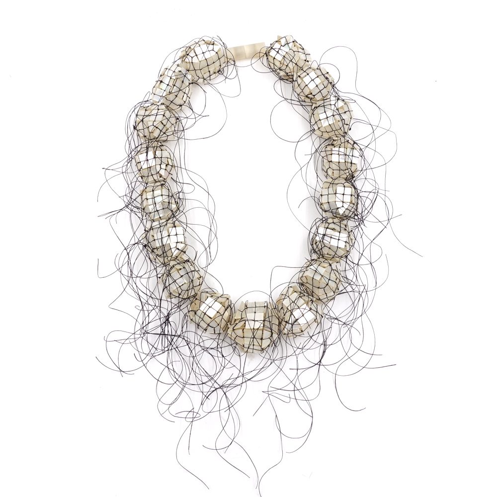 Mother of Pearls III (graduated pearls,black thread) by Caroline Broadhead
