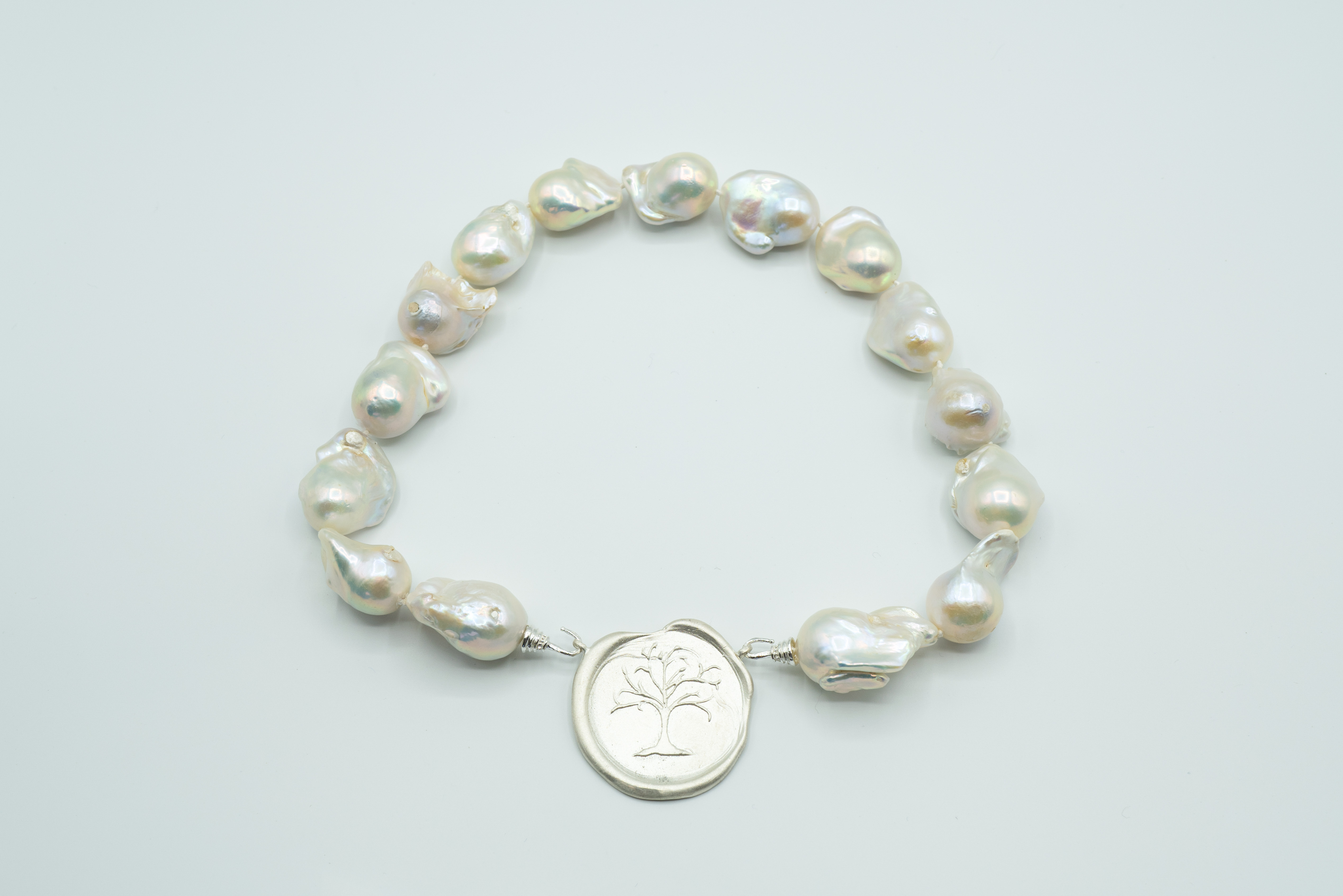 Jumbo Freshwater Baroque Pearls, Smooth Texture Hand Knotted on Hand Cast Sterling Hooks. Unusual and rare pearls approx.