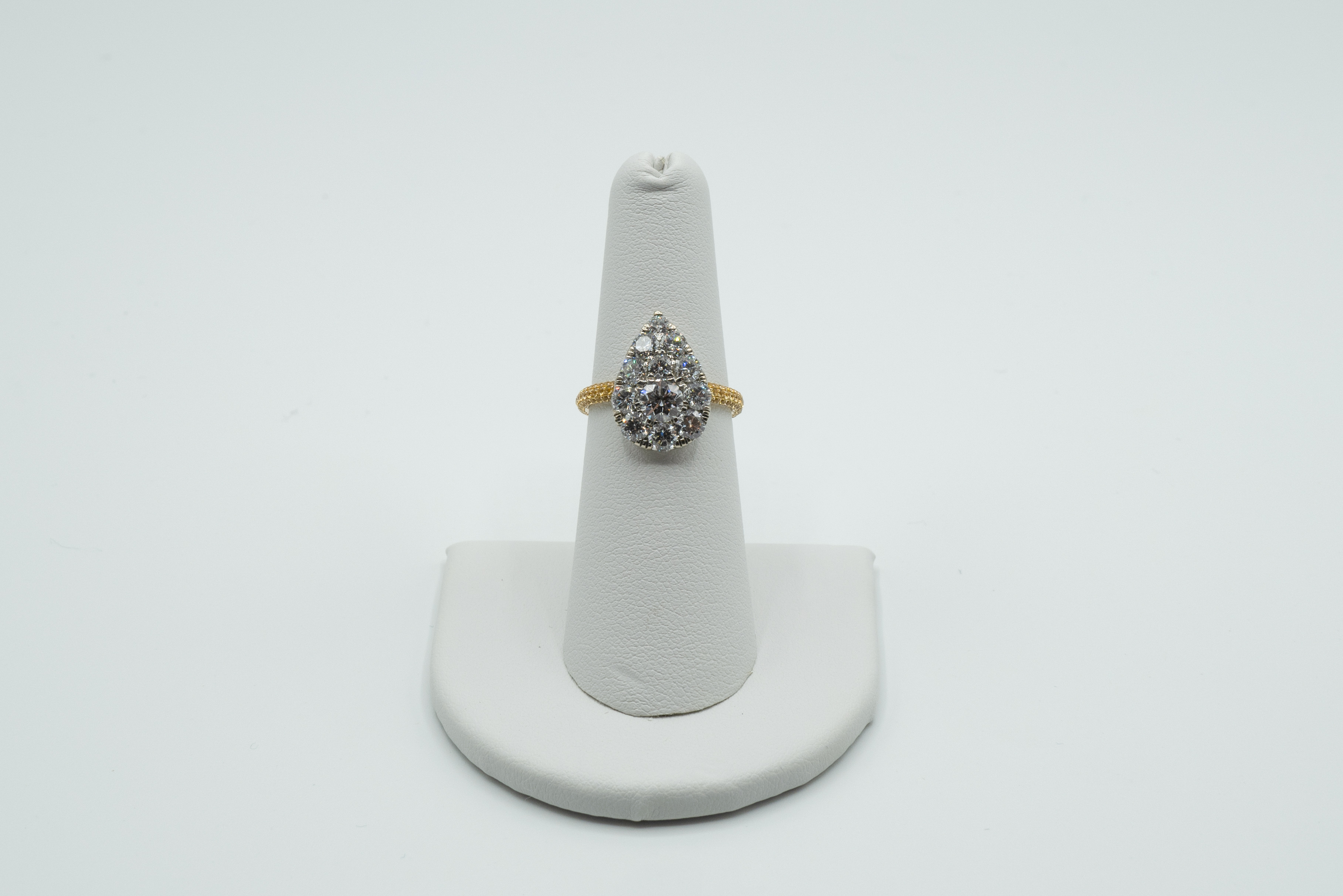 Yellow Sapphire and Diamond Pear Shaped Ring.  Band is 14k Yellow Gold with Yellow Sapphires, top is 1.98 carats diamond in 18k White Gold, Faces Up like approx 6 carats