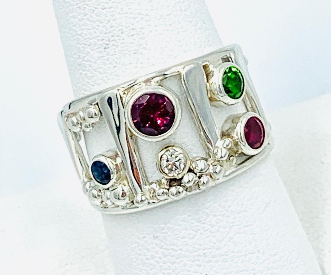 Multi Stone Ring in S/S, 14kt White Gold, .09 Diamond, Garnet, Sapphire, Ruby, Tsavorite.  Size 7.25