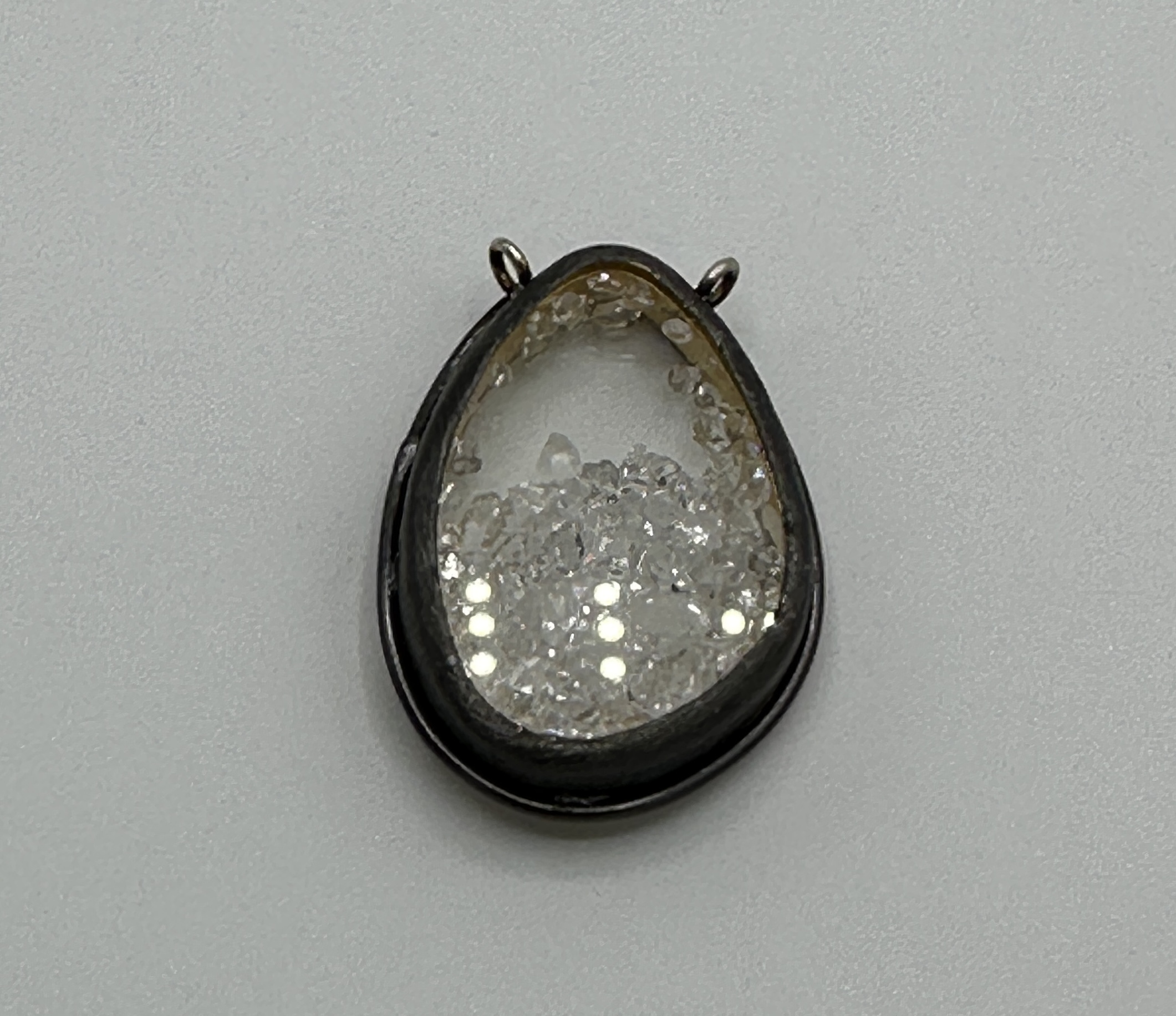 Teardrop Shaped Centerpiece, 925 Sterling, Plated in 18 Karat Gold and Oxidized. Herkimer Diamonds Inside Shaker.