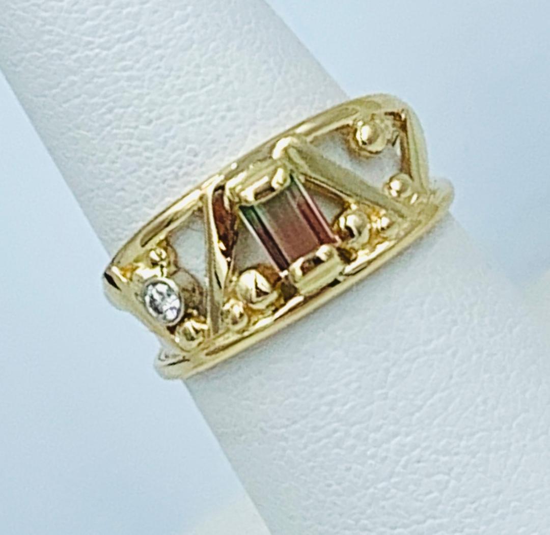 Tourmaline and Diamond Ring in 14kt yellow gold, .42ct. Bi-color Tourmaline, .04 diamond.  Size 7