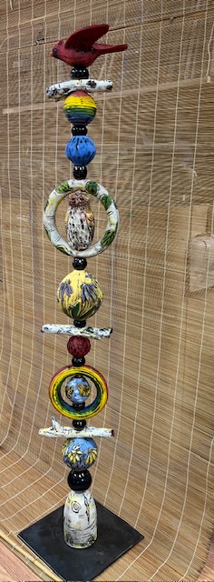 Image of Tall Tower with Cardinal by Nancy Briggs