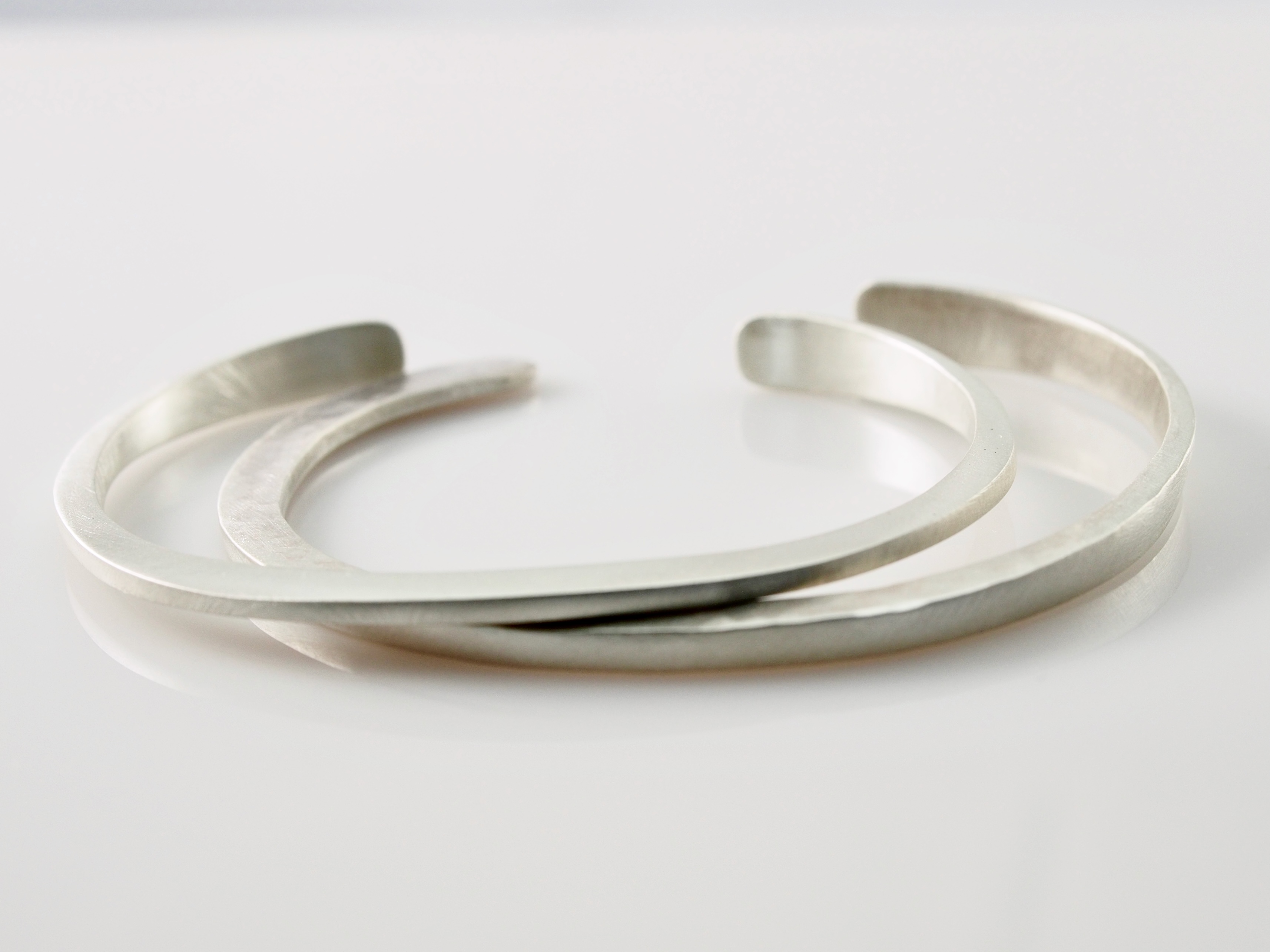 Pair of Hand Honed Sterling Bangles