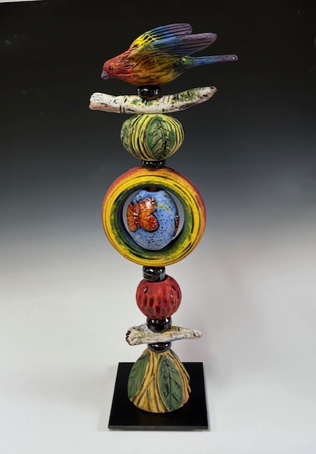 Image of Tower with Rainbow Bird by Nancy Briggs