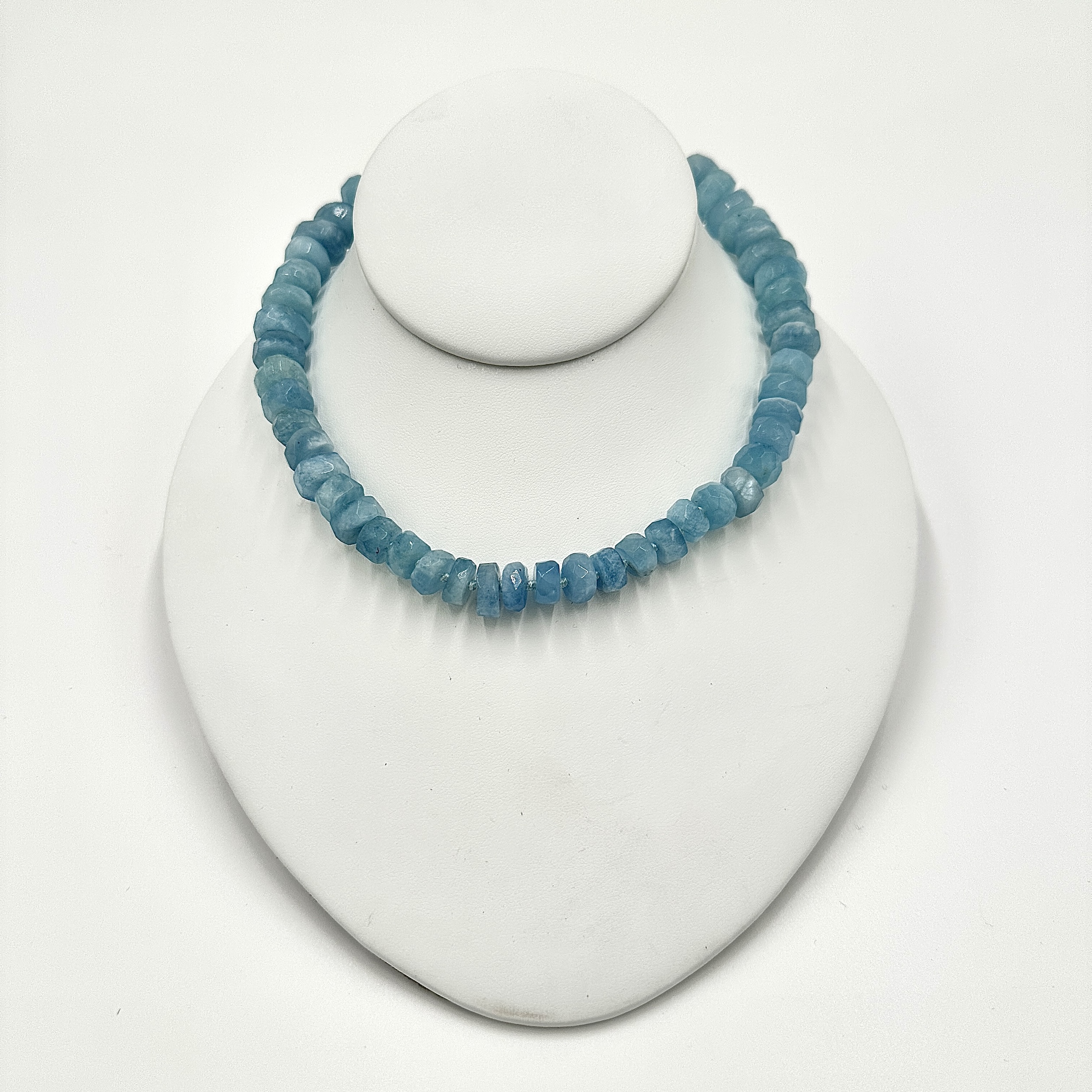 Image of 11 mm to 12 mm Hand Cut Blue and Creamy Aquamarine Rondell on Hand Cast Brass Hooks by Marcia McDonough